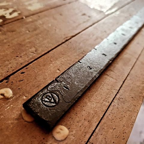 Forged ruler